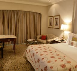 Superior Room King Bed Diplomatic Enclave View